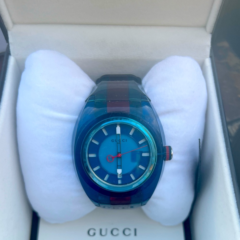 Used Gucci Sync watch. Blue rubber.